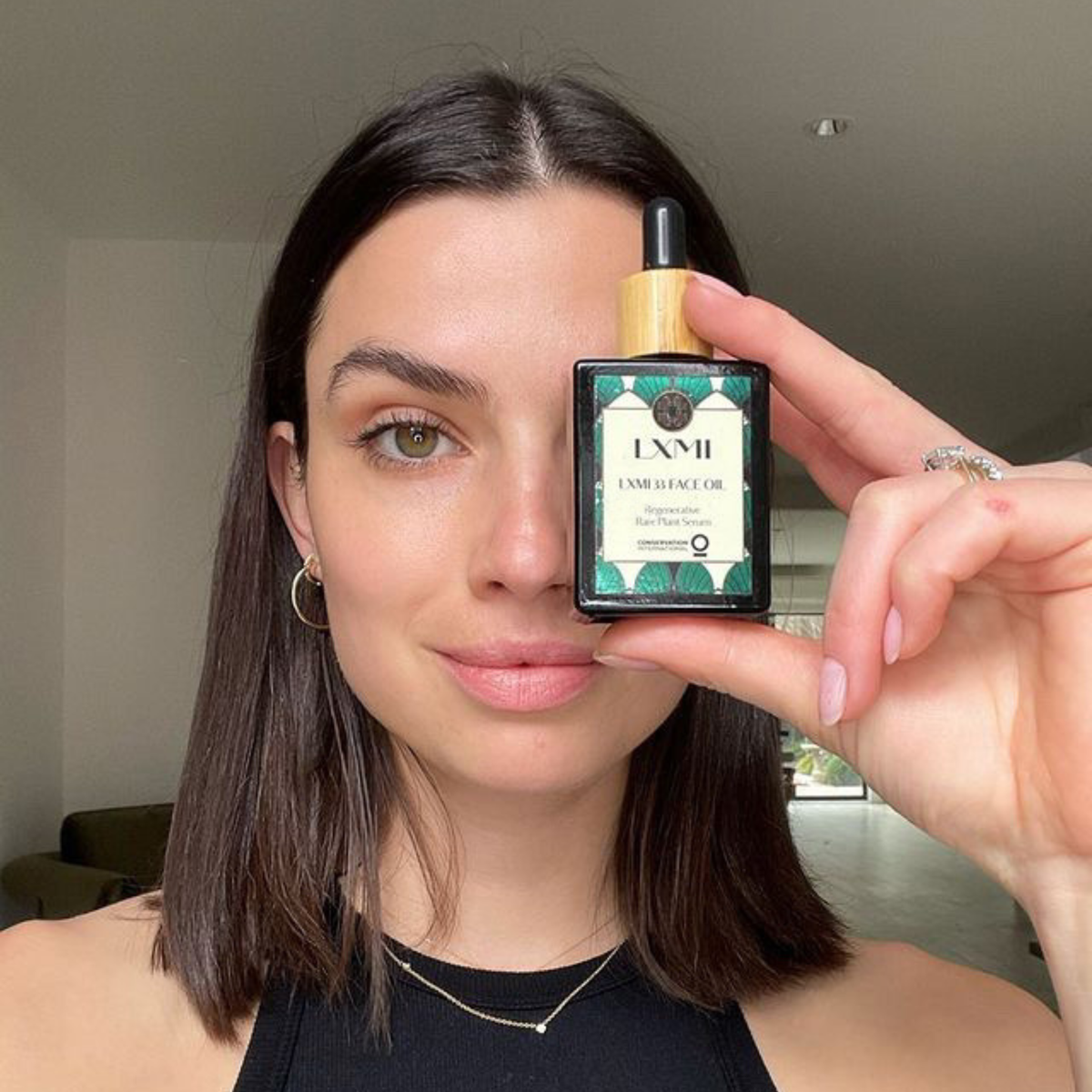 Australian model Nicole Harrison shares how she applies LXMI 33 Face Oil for the perfect glow