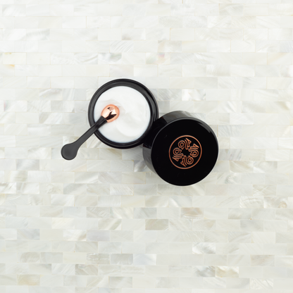 Apply skincare hygienically with LXMI's Copper Wand