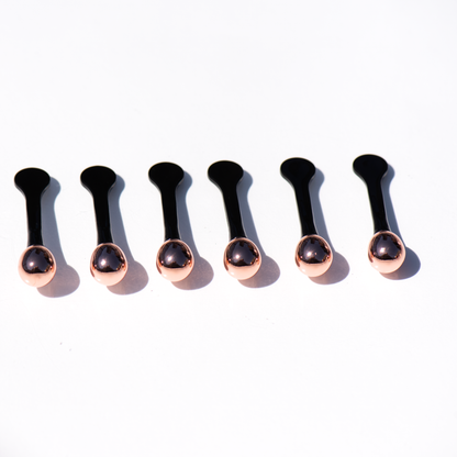 Enhance glow with a quick lymphatic massage with LXMI's Copper Wand